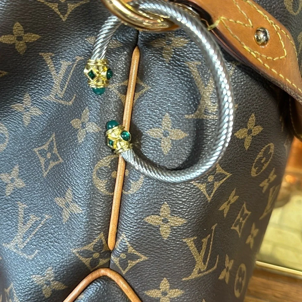Sophisticated Silver and Gold Bracelet with Green Gemstones